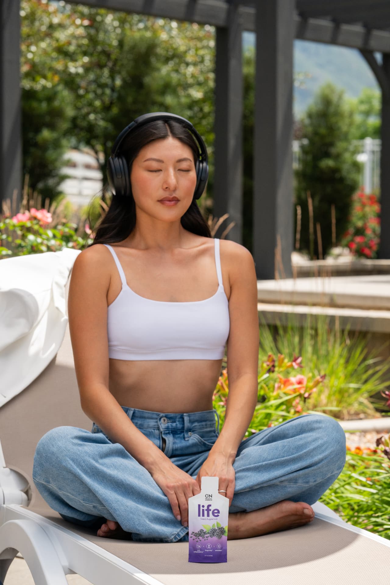 Original Nutrition 'Life' supplement shoot, woman meditating outdoors